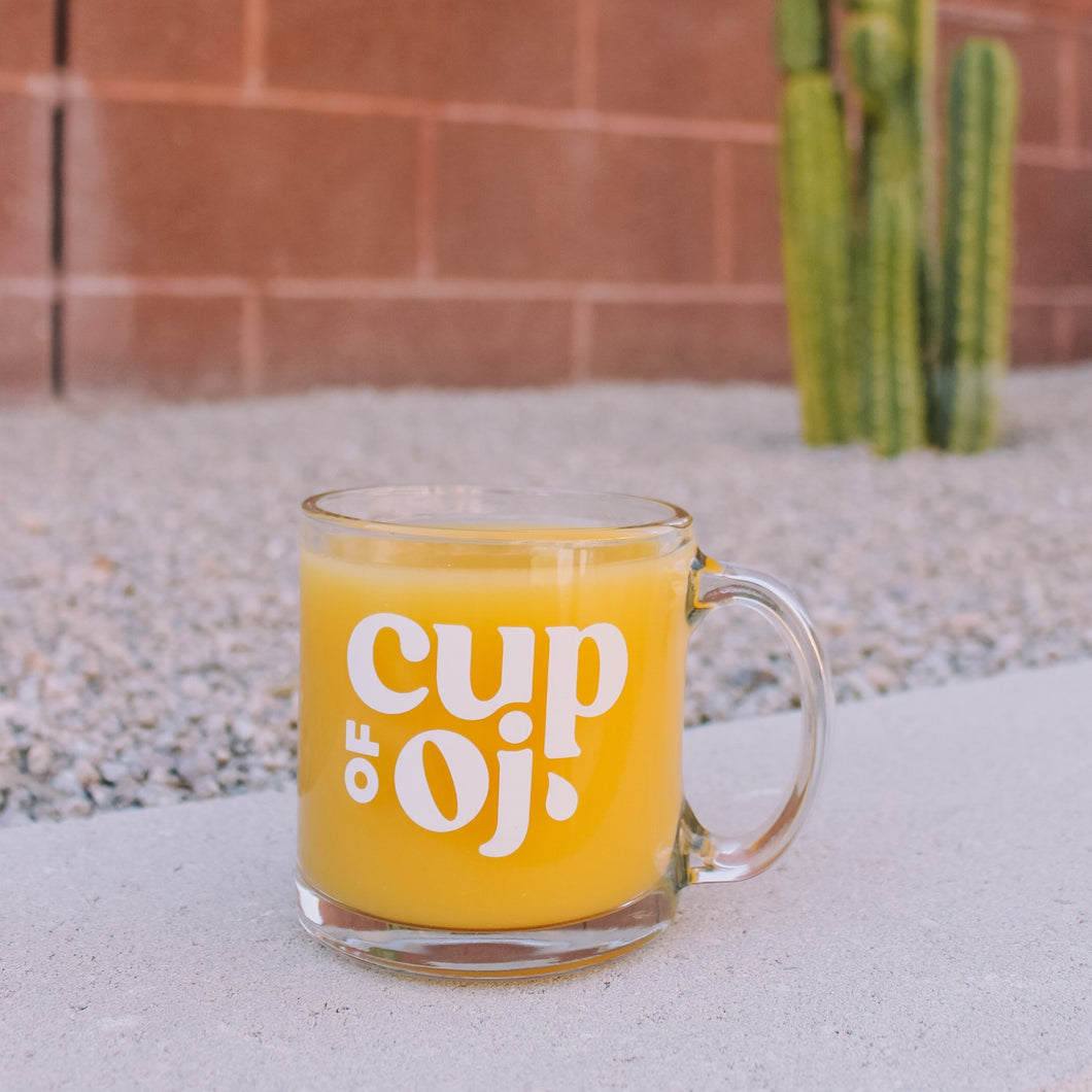 glass cup of oj mug
